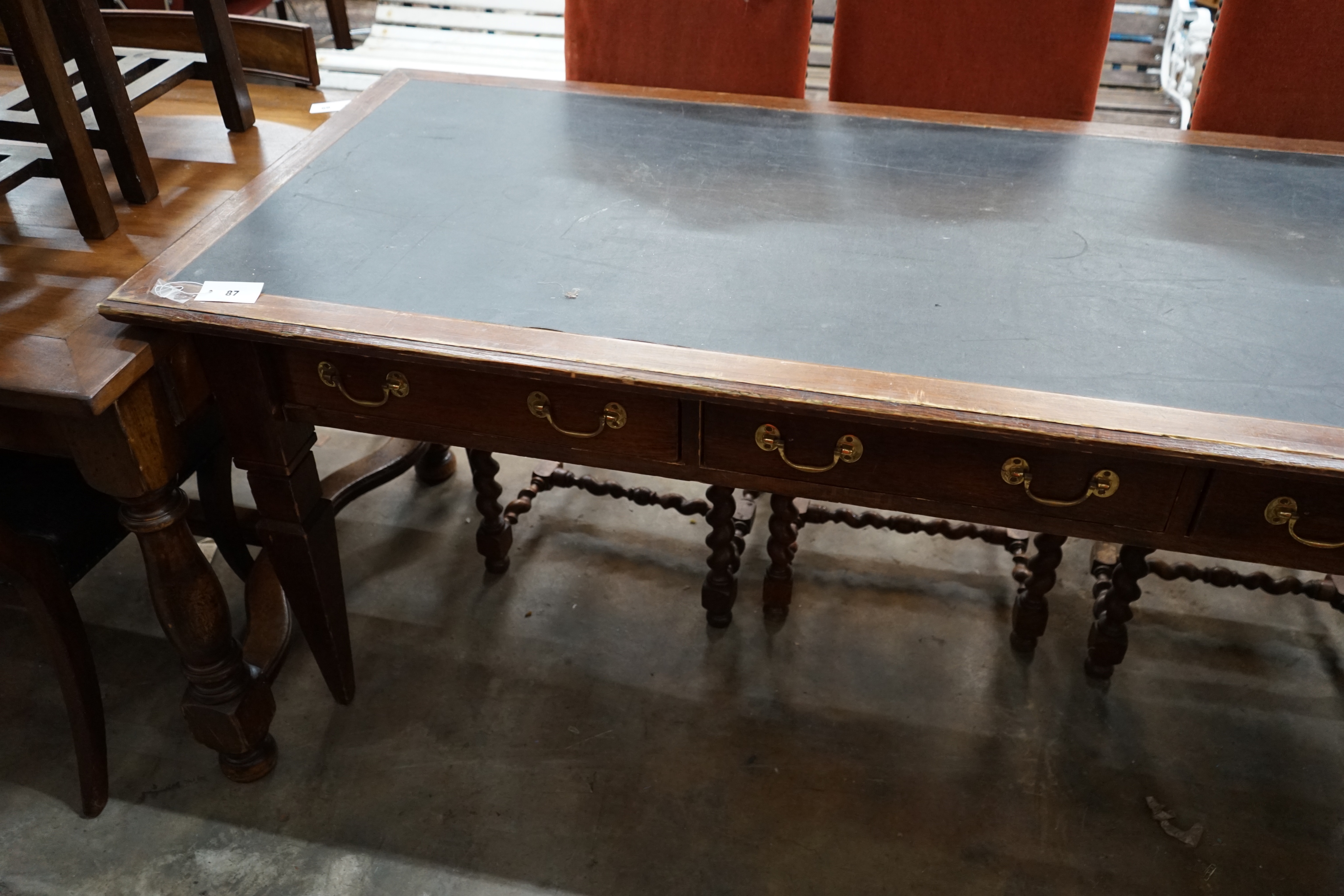 An early 20th century rectangular mahogany three drawer library table, width 190cm depth 79cm height 80cm